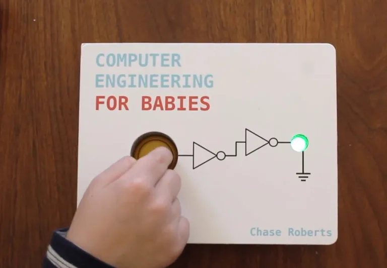 Kniha Computer Engineering for Babies s obrázkem logických hradel a dětskou rukou