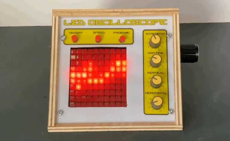 Přední panel LED osciloskopu s rozsvícenou maticí a ovládacími knoflíky