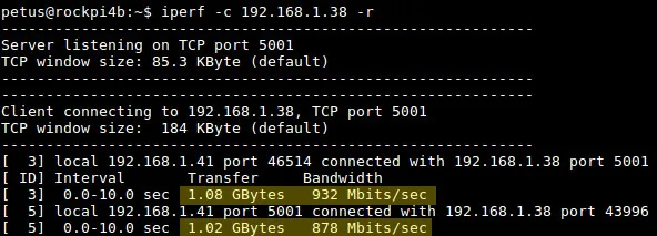 Terminál zobrazuje výsledek testu iperf přes gigabitový Ethernet s rychlostí 878 Mbit/s